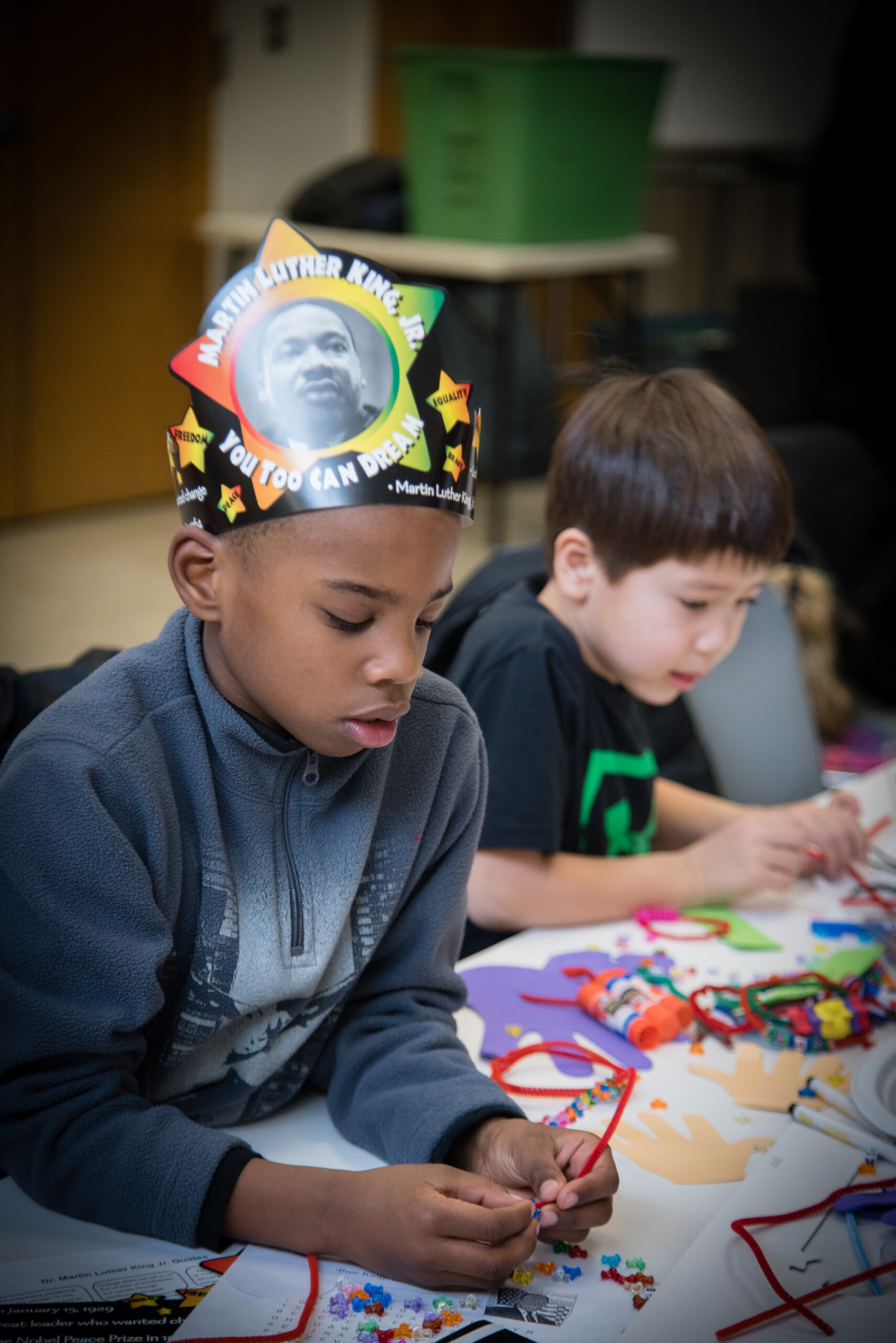 Children creating crafts during a Martin Luther King Jr. Day activity at Reston Community Center.