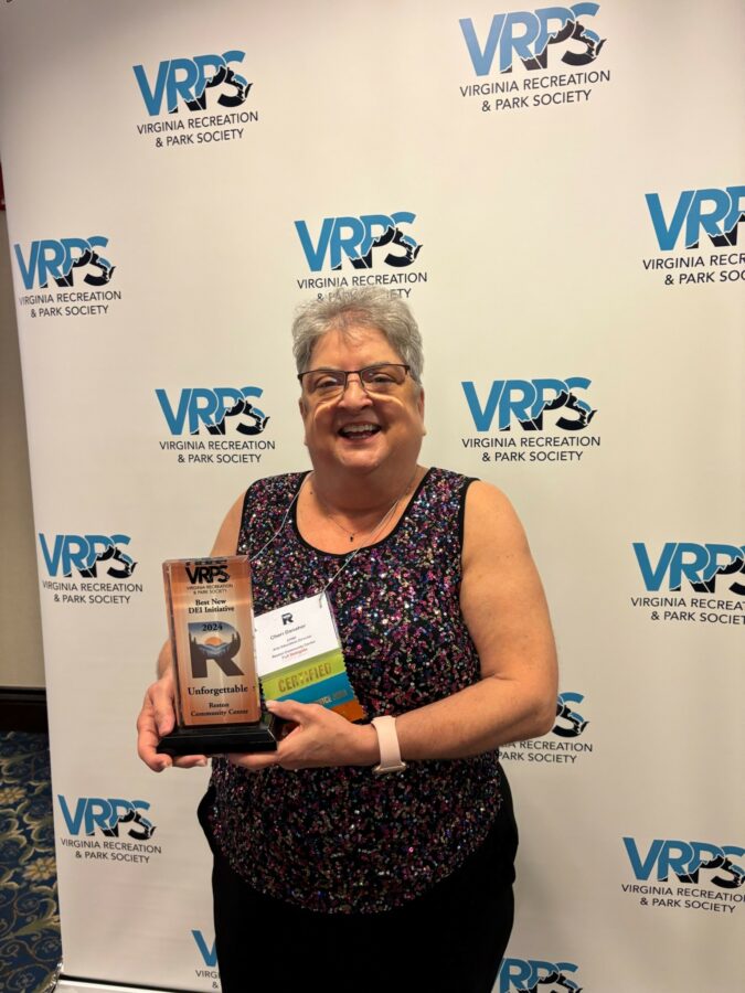 Cheri Danaher, RCC Arts Education Director, accepts the VRPS Best New DEI Initiative Award for Unforgettable. Image Credit – Reston Community Center